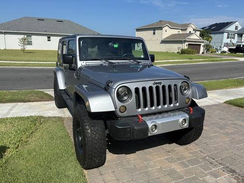 Silver 2013 Jeep Wrangler Unlimited Sahara