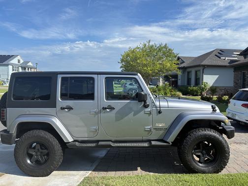 Silver 2013 Jeep Wrangler Unlimited Sahara