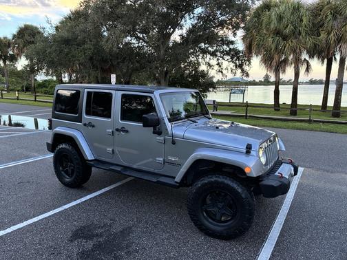 Silver 2013 Jeep Wrangler Unlimited Sahara