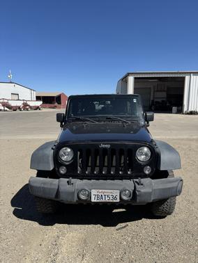Black 2014 Jeep Wrangler Unlimited Rubicon