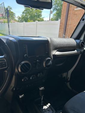 White 2016 Jeep Wrangler Unlimited Sport