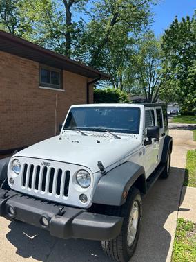 White 2016 Jeep Wrangler Unlimited Sport