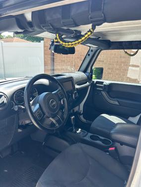 White 2016 Jeep Wrangler Unlimited Sport