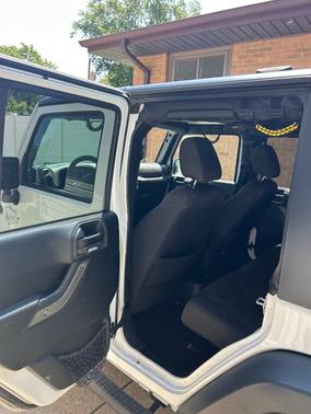 White 2016 Jeep Wrangler Unlimited Sport