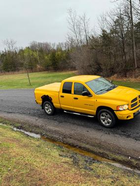 Yellow 2005 Dodge Ram 1500 SLT Quad Cab