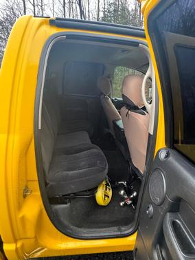 Yellow 2005 Dodge Ram 1500 SLT Quad Cab
