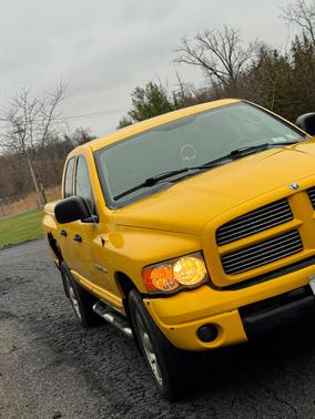 Yellow 2005 Dodge Ram 1500 SLT Quad Cab