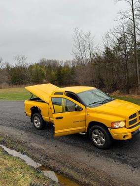Yellow 2005 Dodge Ram 1500 SLT Quad Cab