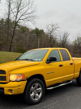 Yellow 2005 Dodge Ram 1500 SLT Quad Cab