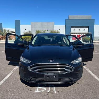 Black 2020 Ford Fusion Hybrid SE