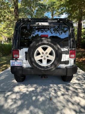 White 2012 Jeep Wrangler Unlimited Sport
