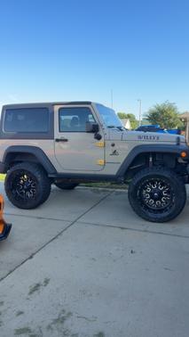 Beige 2016 Jeep Wrangler Willys Wheeler