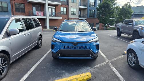 Blue 2026 Toyota Corolla Cross Hybrid XSE