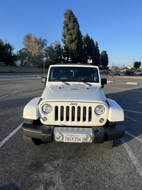 White 2014 Jeep Wrangler Sahara