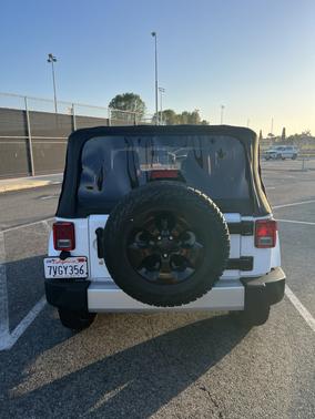 White 2014 Jeep Wrangler Sahara