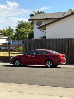 Red 2015 Kia Optima LX