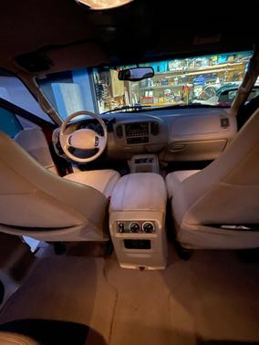 Red 2000 Ford Expedition Eddie Bauer