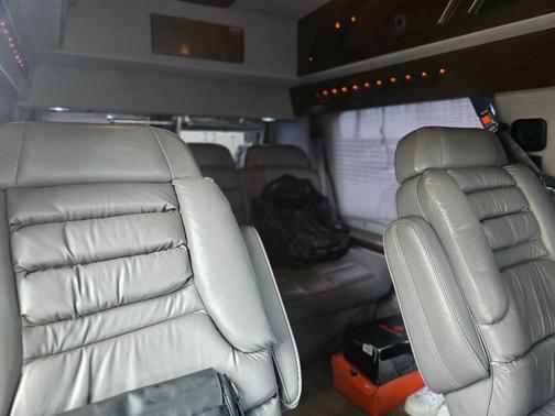 Green 1999 Ford E150 Base