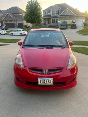 Red 2007 Honda Fit Sport