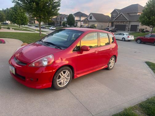 Red 2007 Honda Fit Sport