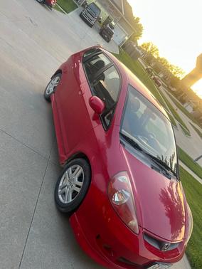 Red 2007 Honda Fit Sport