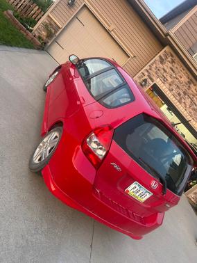 Red 2007 Honda Fit Sport