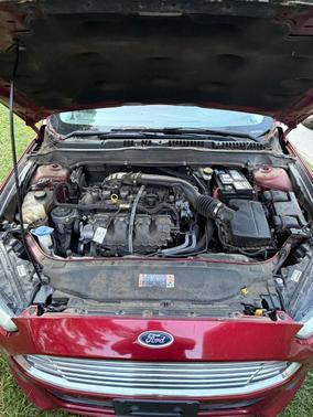 Red 2014 Ford Fusion SE