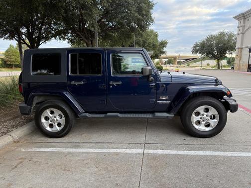 Blue 2013 Jeep Wrangler Unlimited Sahara
