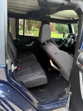 Blue 2013 Jeep Wrangler Unlimited Sahara