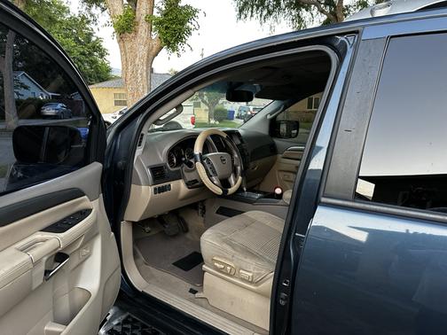 Green 2015 Nissan Armada SV