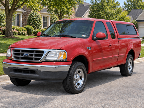 Red 2000 Ford F-150 XLT SuperCab