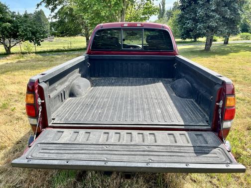 Red 2001 Toyota Tundra Limited Access Cab