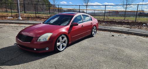 Red 2004 Nissan Maxima SE