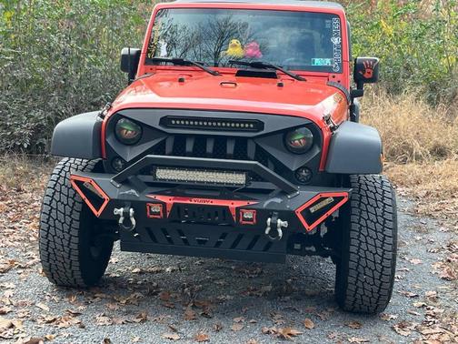 Orange 2015 Jeep Wrangler Unlimited Sport