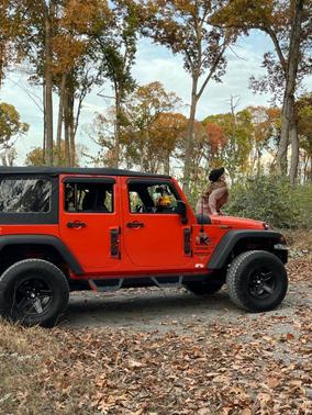 Orange 2015 Jeep Wrangler Unlimited Sport