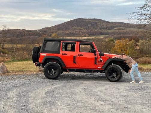Orange 2015 Jeep Wrangler Unlimited Sport