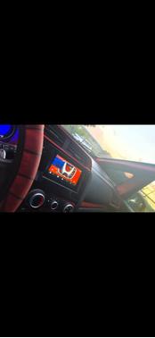 Red 2015 Honda Fit EX-L