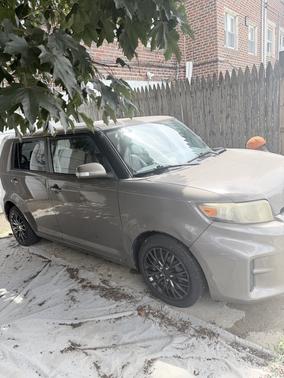 Green 2011 Scion xB Base