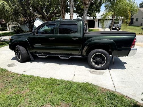 Green 2014 Toyota Tacoma PreRunner