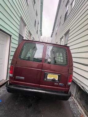 Red 2009 Ford E350 Super Duty XL Extended Wagon