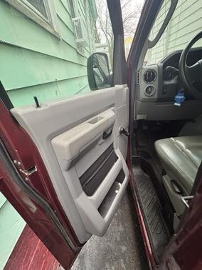 Red 2009 Ford E350 Super Duty XL Extended Wagon