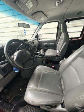 Red 2009 Ford E350 Super Duty XL Extended Wagon