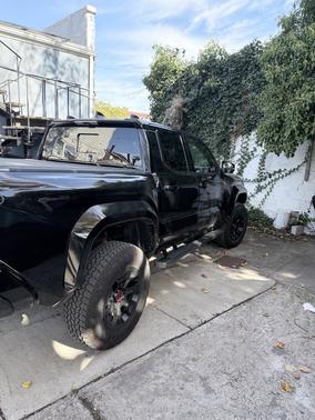 Black 2025 Toyota Tacoma Hybrid TRD Pro