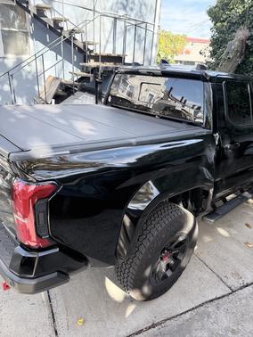 Black 2025 Toyota Tacoma Hybrid TRD Pro