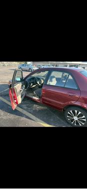 Red 2002 Mazda Protege LX