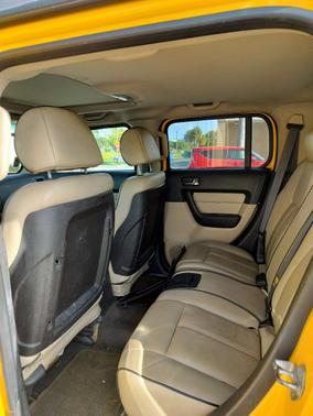 Yellow 2006 Hummer H3 Base