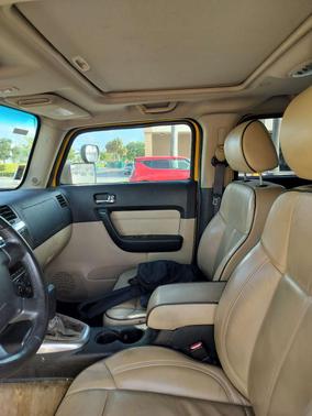 Yellow 2006 Hummer H3 Base