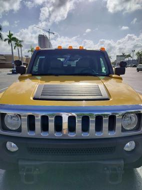 Yellow 2006 Hummer H3 Base