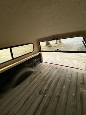 Red 2002 Ford F-150 XL SuperCab