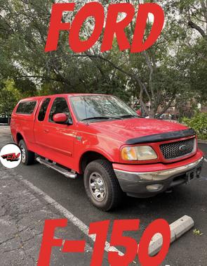 Red 2002 Ford F-150 XL SuperCab
